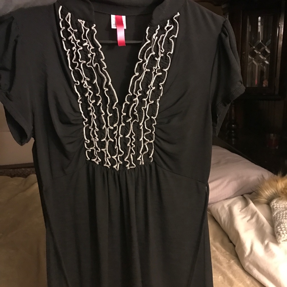 Black ruffled blouse